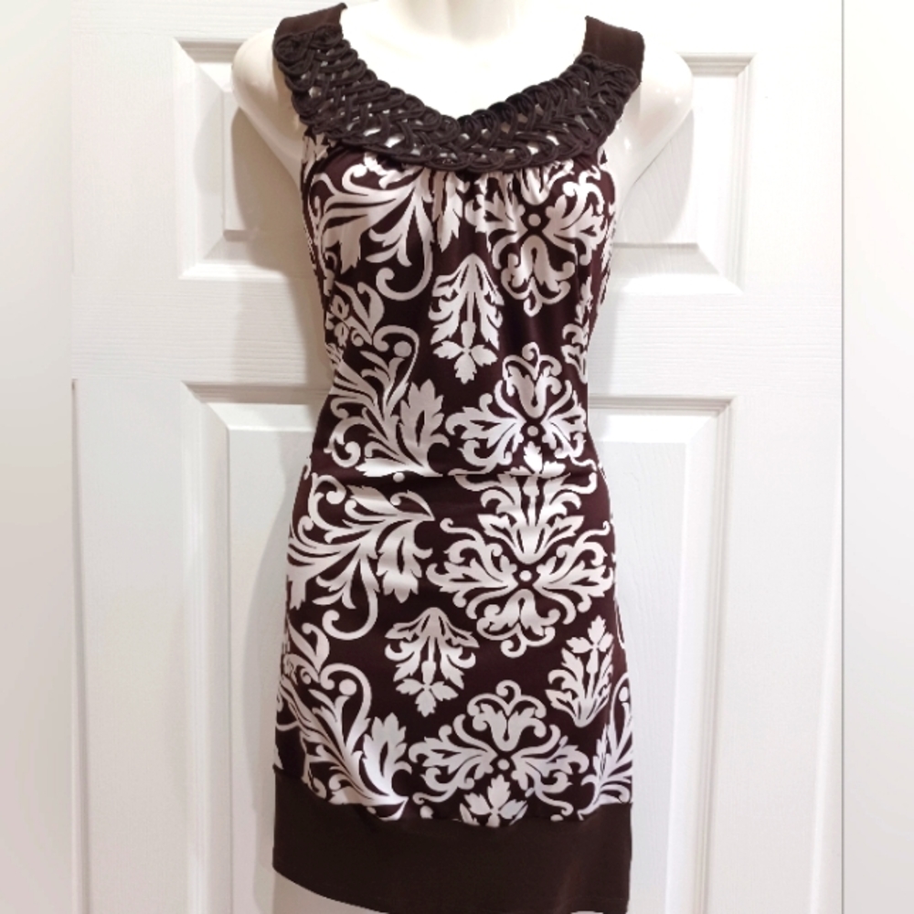 Sexy slip on print dress Size Small with stretch  it fits up to a 7/8.